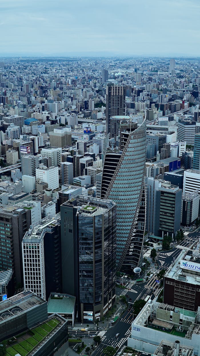 High-angle view capturing the expansive skyline of a modern, bustling city with towering skyscrapers.
